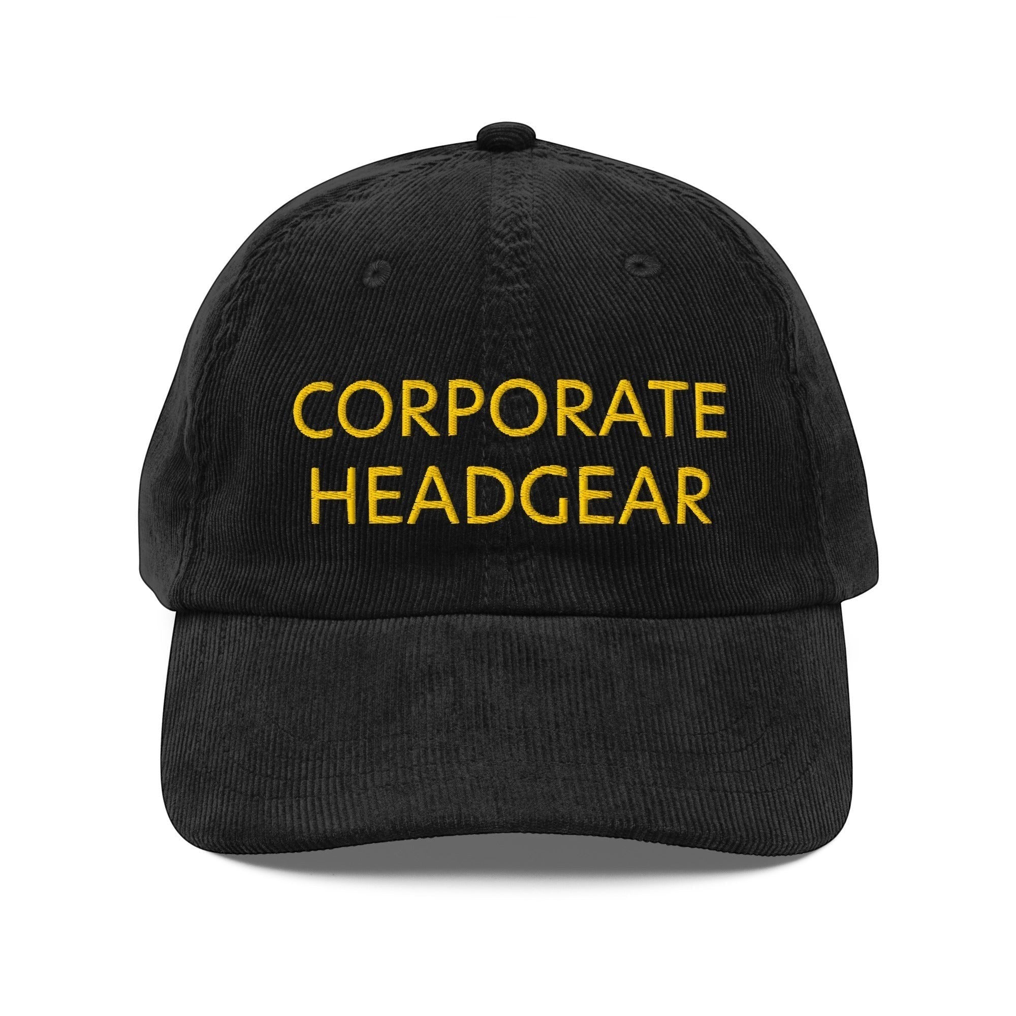 Corporate Headgear black corduroy cap with yellow embroidered text and adjustable gold buckle strap.